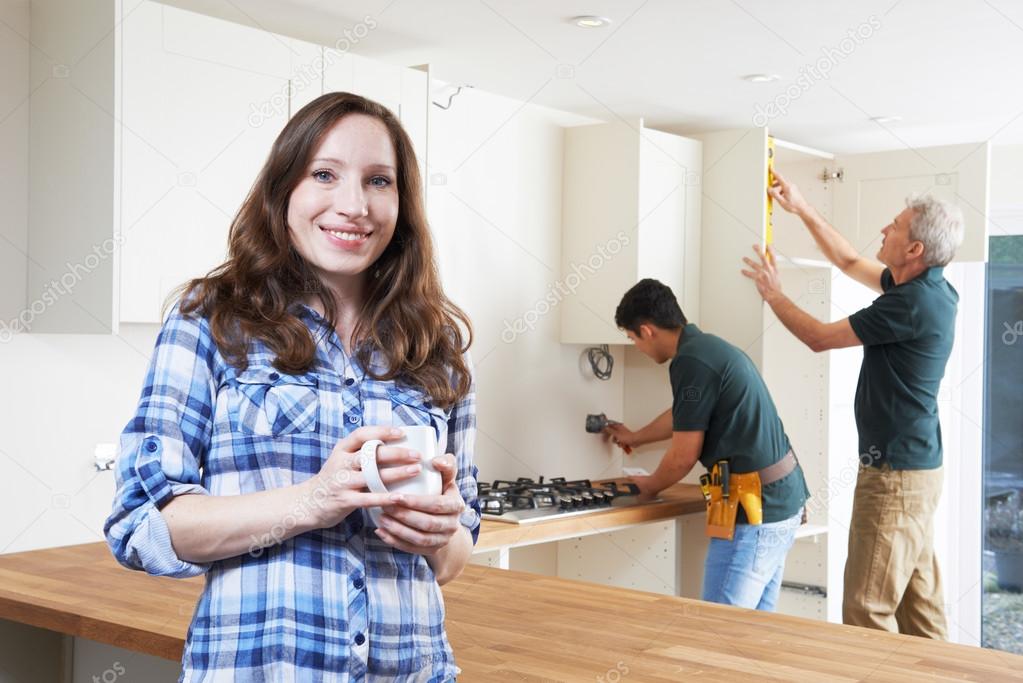 Portrait Of Woman Having New Kitchen Fitted