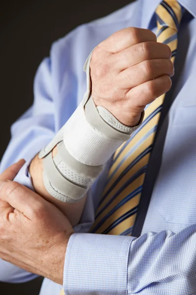 Close Up Of Businessman Suffering With Repetitive Strain Injury — Stock Photo, Image