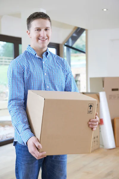 Young Man Moving Into New Home — Stock Photo, Image