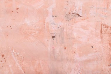 Pembe tonlarda boyanmış tuval.