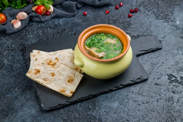 Putuk Soup Bowl Black Stone Table — Stock Photo, Image