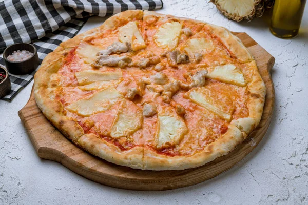 pizza Hawaiian with pineapple and chicken