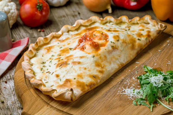 Closed Calzone Pizza Wooden Board — Stock Photo, Image