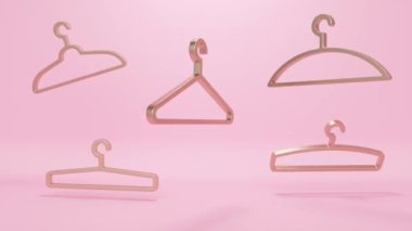 Pembe soyut arka plan ve altın uçan elbise askıları. Asgari modern kusursuz hareket tasarımı.