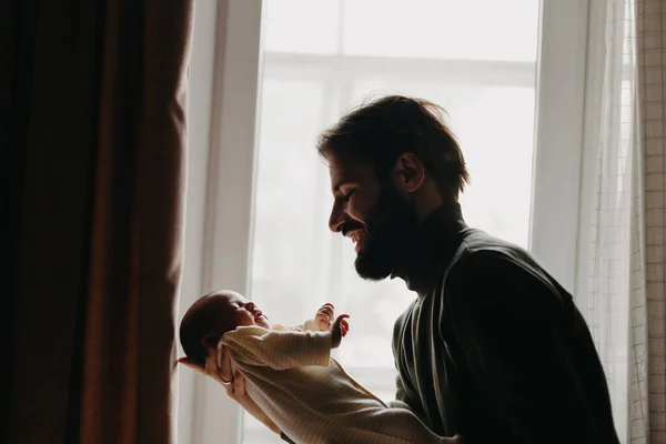 Silhouette Stylish Bearded Father Kisses Sleeping Newborn Girl Parent Holding — Stock Photo, Image
