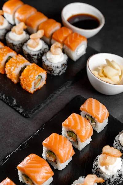 Background for Japanese cuisine menu with rolls, ginger and wasabi