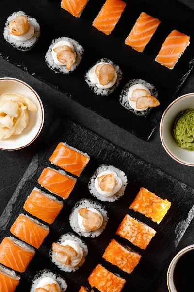 Background for Japanese cuisine menu with rolls, ginger and wasabi