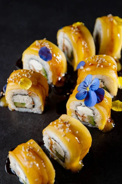 Background for Japanese cuisine menu with rolls, ginger and wasabi