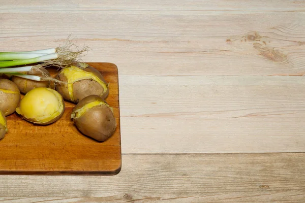 Potatoes Cooked Peel Wooden Table Green Onion Pickled Cucumbers — Stock Photo, Image