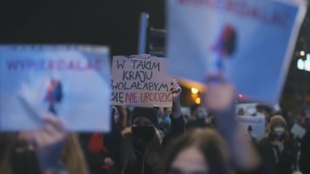 Warsaw, Poland 23.10.2020 - Protest against Polands abortion laws. I would prefer not to be born in such a country banner in crowd — Stock Video