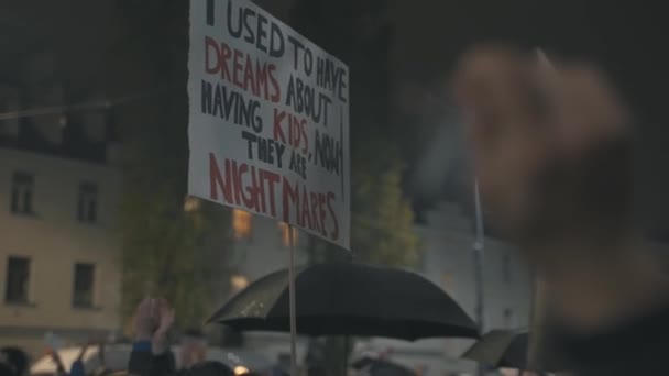 Warsaw, Poland 23.10.2020 - Protest against Polands abortion laws.Womens rights are human rights. Crowd with banners and rainbow flags — Stock Video