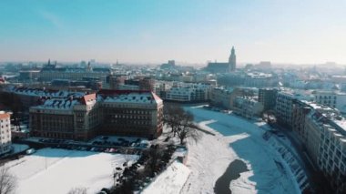 Aerial view of the snow-covered street in the city of Wroclaw, Poland - Winter season 