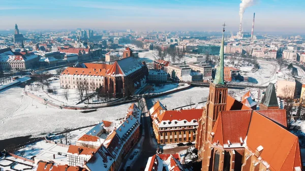 Stary Rynek square and old market square in the city of Wroclaw, Poland. Smoke coming out of the chimneys from the power plant — стокове фото