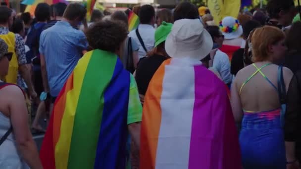 LGBTQ Rights In A Pride Parade - Back View Of People Wearing LGBTS Rainbow Flags — Stock Video