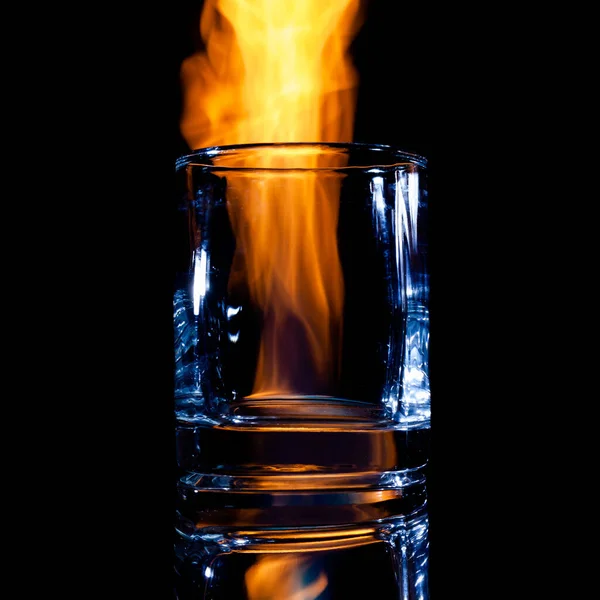 Burning empty glass glass, copy space, isolate — Stock Photo, Image