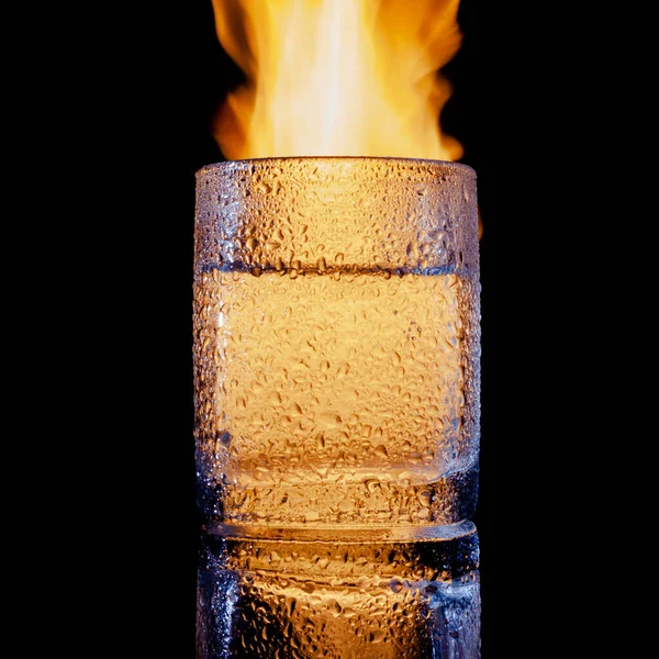 Fire and water and black background, place under the text — Stock Photo, Image