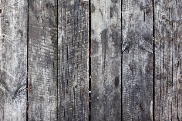 Starý šedý dřevěný plot. Použít jako pozadí nebo strukturu — Stock fotografie