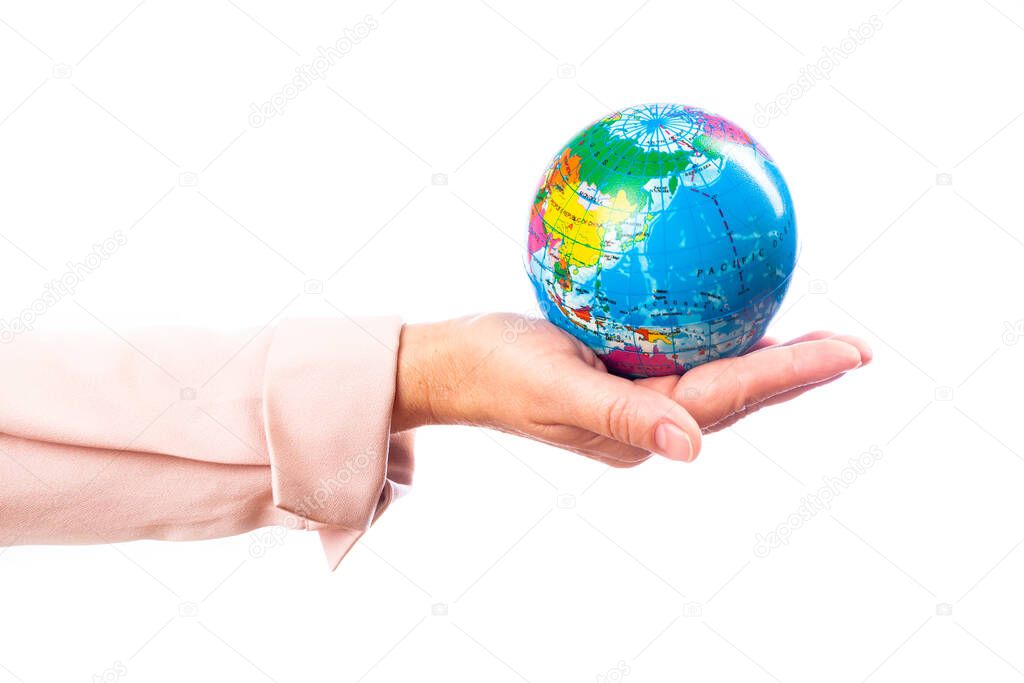 woman holds planet earth in her hand on a white background, isolate