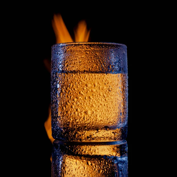 Fire and water and black background, place under the text — Stock Photo, Image