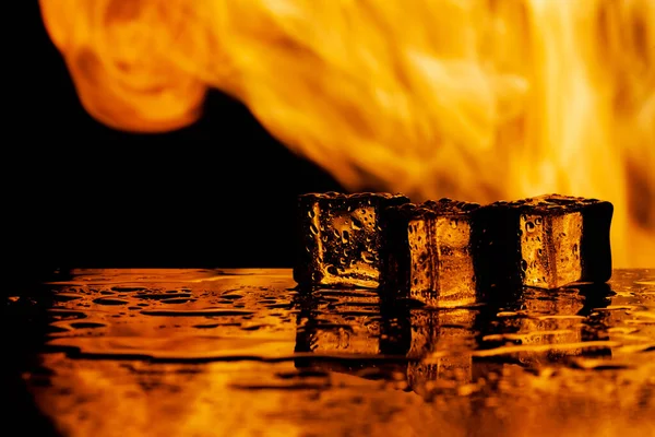 water and fire, ice and flame, black background, place under the text