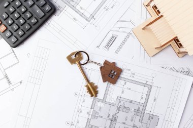 Evin yapısını hesaplamak, çizimlerdeki evin yerleşimini, inşaat anahtarının maliyetini hesaplamak.