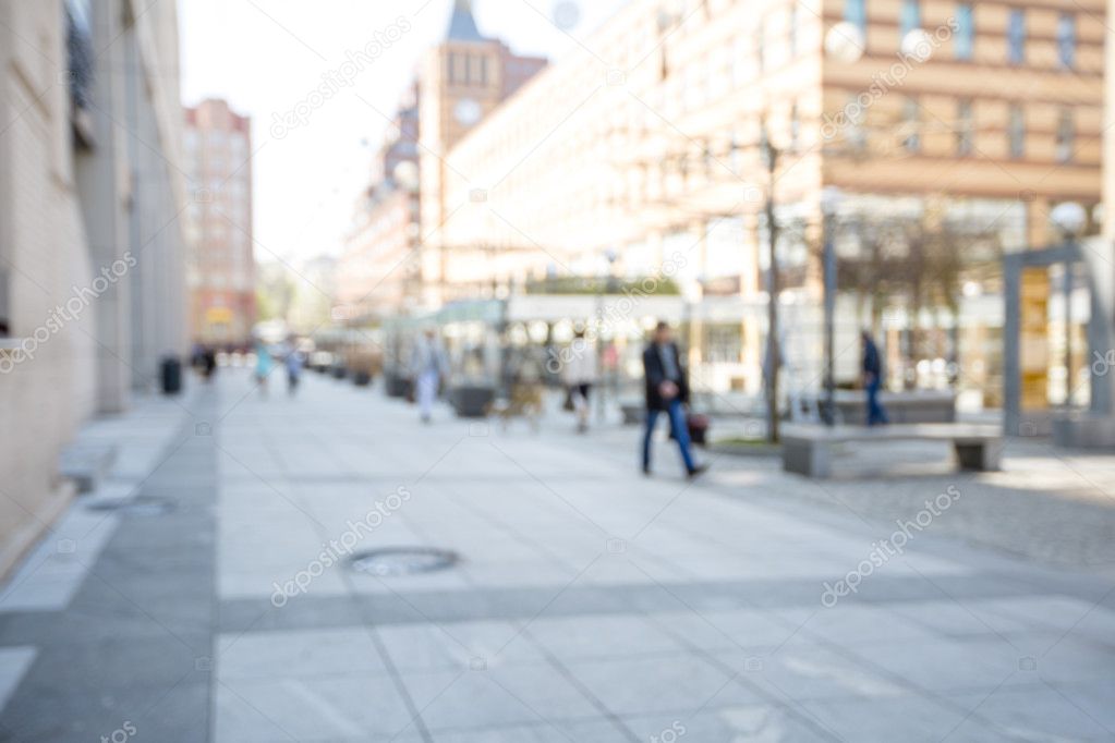 people walking on a city street