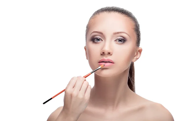 Vrouw die lippenstift aanbrengt — Stockfoto