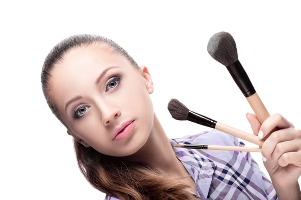 Vrouw met make up borstels — Stockfoto