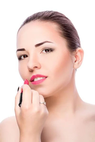 Kvinna som applicerar läppstift — Stockfoto