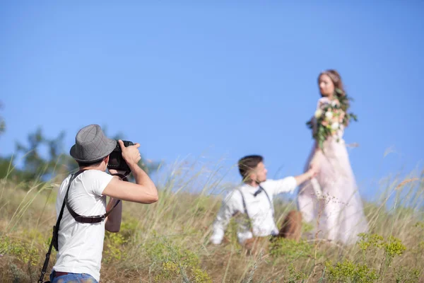 Fotograf w akcji — Zdjęcie stockowe