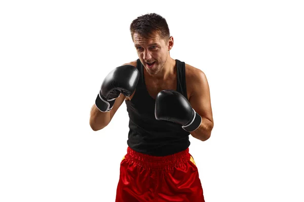 Hombre deportivo en guantes de boxeo negro puñetazos —  Fotos de Stock