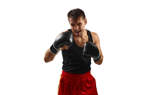 Hombre deportivo en guantes de boxeo negro puñetazos — Foto de Stock