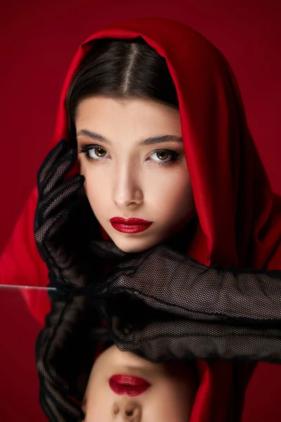 Brunette woman with red lips and veil over her head — Stock Photo, Image