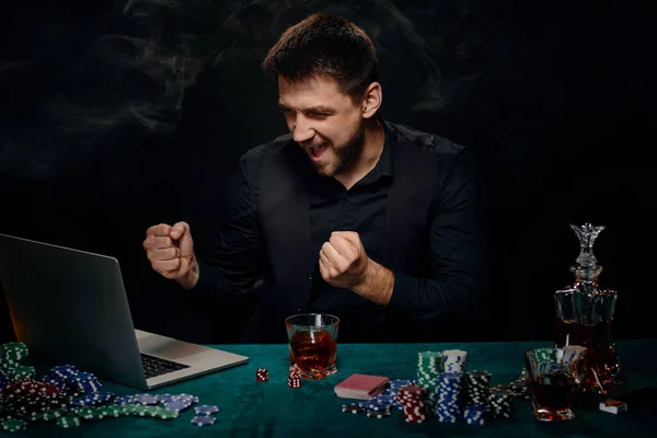 Bearded online casino player man celebrating victory