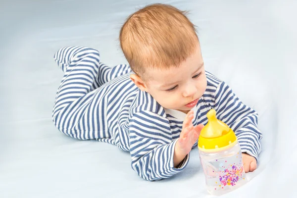 Baby and bottle — Stock Photo, Image