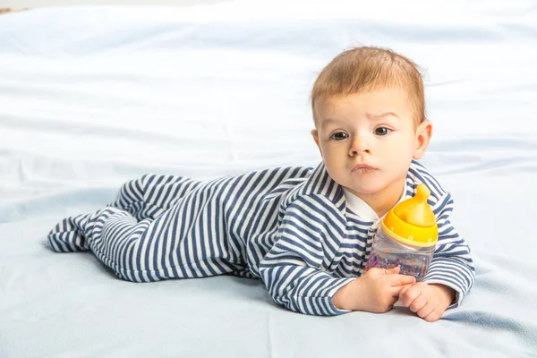 Baby and bottle — Stock Photo, Image