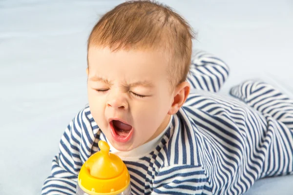 Baby and bottle — Stock Photo, Image