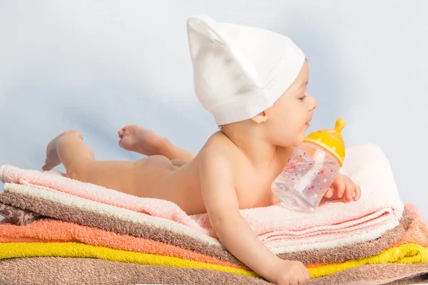 Baby and bottle — Stock Photo, Image