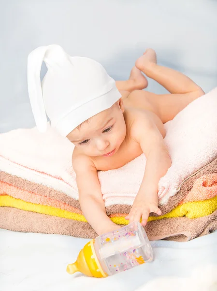 Baby and bottle — Stock Photo, Image