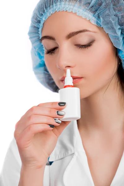 Doctor drips drops for nose — Stock Photo, Image