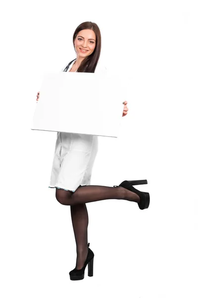 Doctor showing clipboard for text — Stock Photo, Image