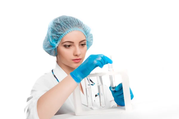 Doctor  holding  vial — Stock Photo, Image