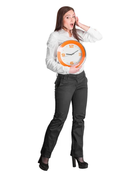 Zakenvrouw bedrijf klok — Stockfoto