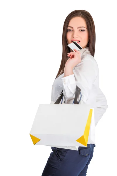 Mujer con bolsas de compras y tarjeta de crédito — Foto de Stock