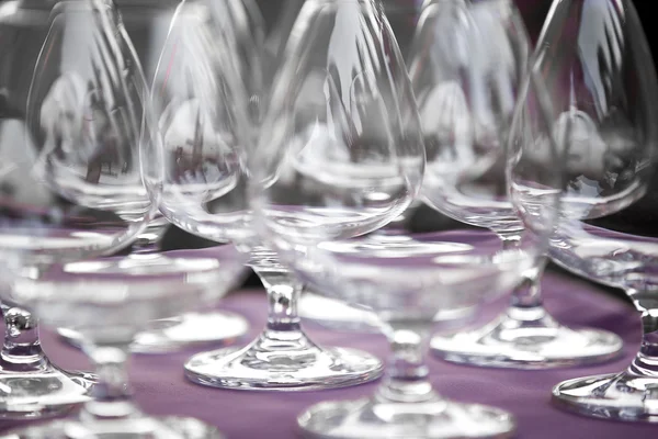 Glasses defocused on buffet table — Stock Photo, Image