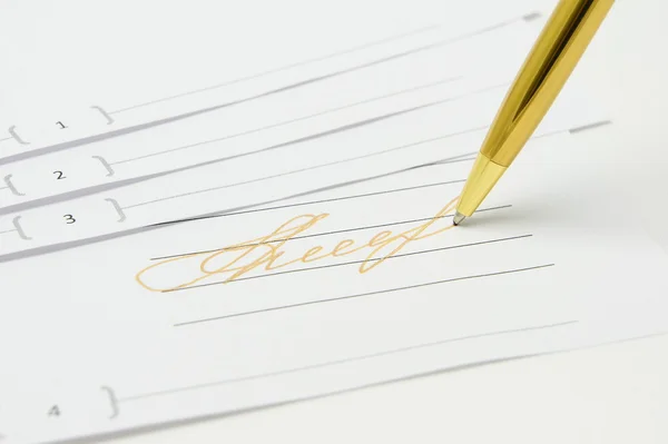 Gold signature. Golden pen is on the document. — Stock Photo, Image