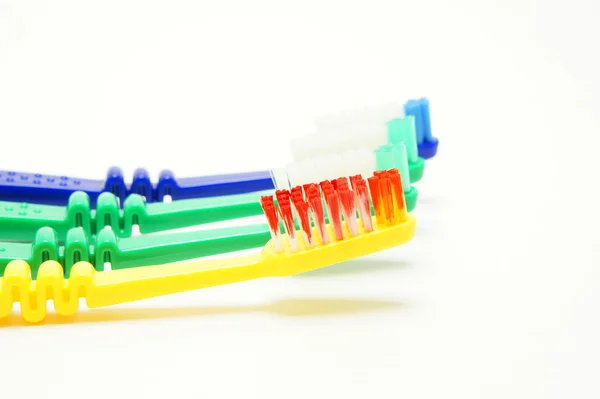 Gingivitis. Periodontitis. Toothbrushes with simulated lesions of the gums. — Stock Photo, Image