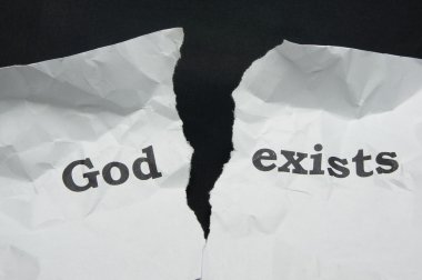 Atheism. Torn sheet of paper with the inscription. clipart