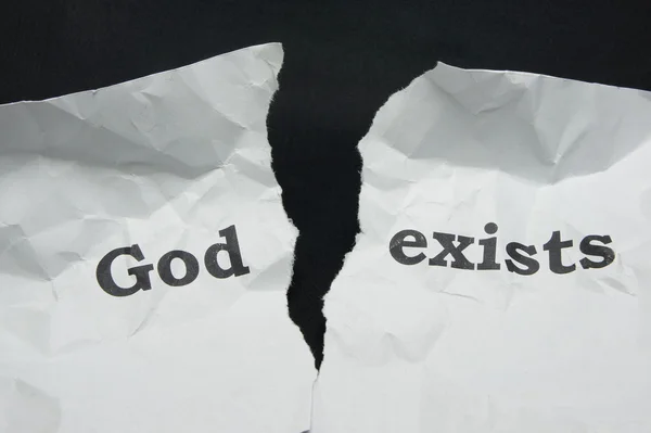 Atheism. Torn sheet of paper with the inscription. — Stock Photo, Image