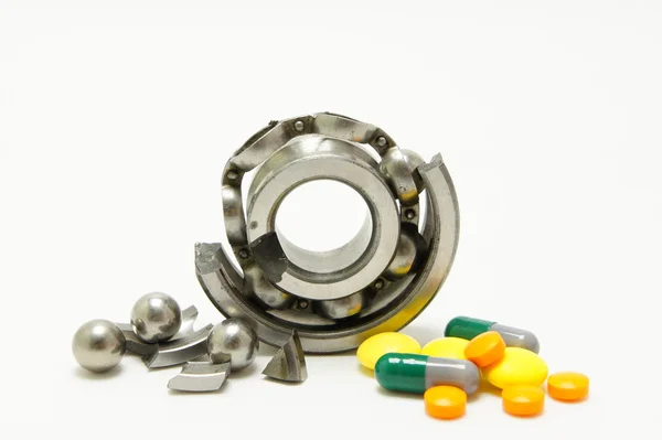 Arthrosis. Ruined joint. Chopped bearing with pills.